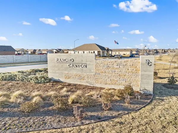 a view of car parked in front of building