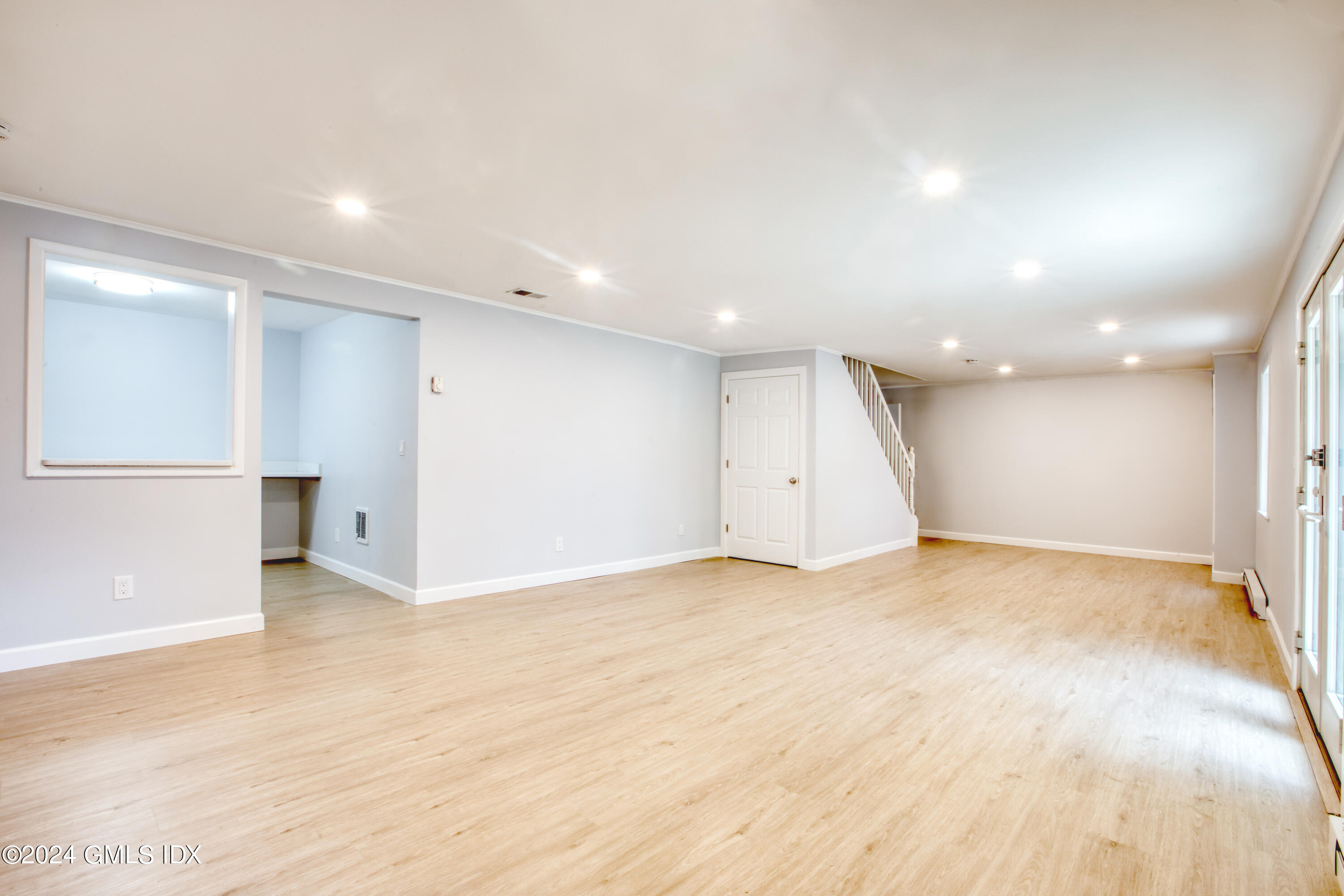 8 Ridge Place, Unit 1 Greenwich, CT 06831 - Photo 26 of 38 LL FAMILY ROOM W/GREAT STORAGE