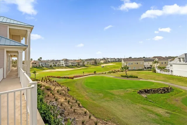 a view of a swimming pool and an ocean view