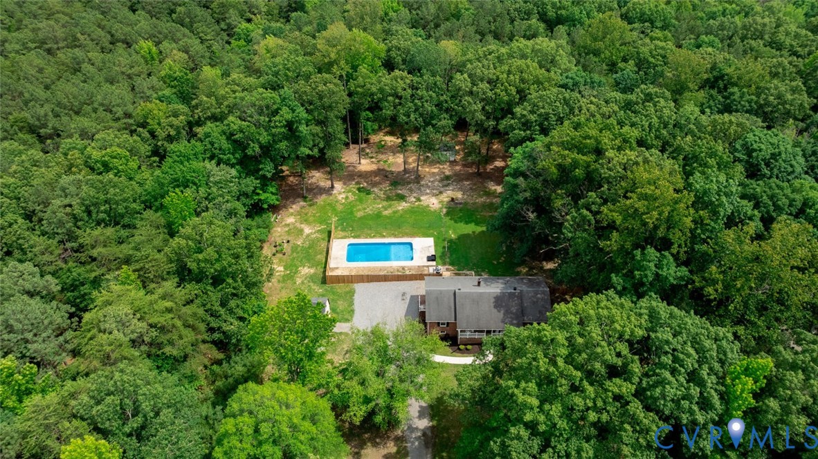 12397 New Market Mill Road Beaverdam, VA 23015 - Photo 44 of 44 a view of a house with a yard