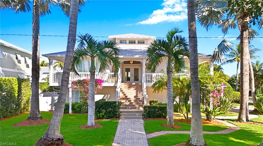 View of property with stairway