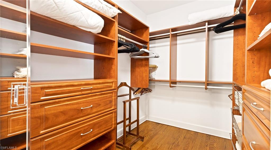 877 7th Street South Naples, FL 34102 - Photo 17 of 45 Walk in closet featuring light wood finished floors