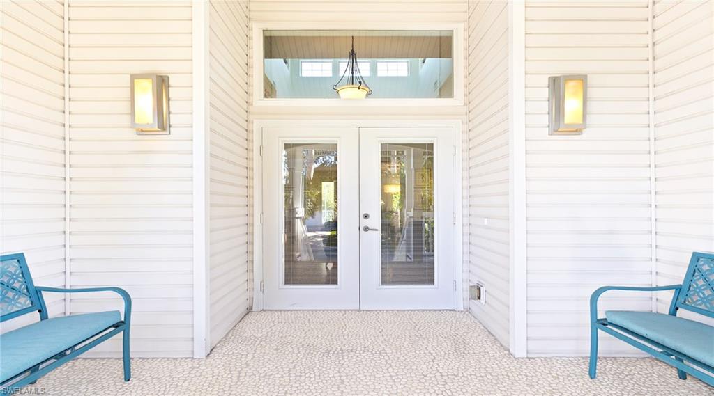877 7th Street South Naples, FL 34102 - Photo 4 of 45 Doorway to property featuring french doors