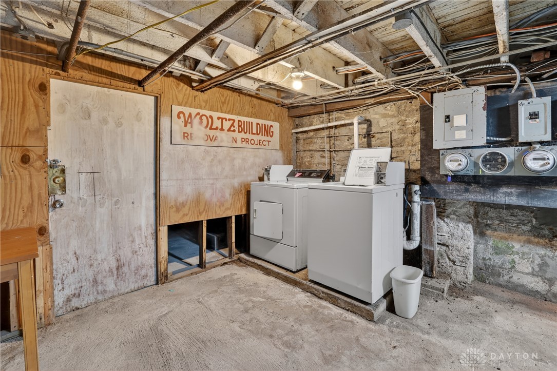 7045-7049 Montgomery Road Cincinnati, OH 45236 - Photo 39 of 68 This functional basement laundry area provides essential convenience for everyday living.