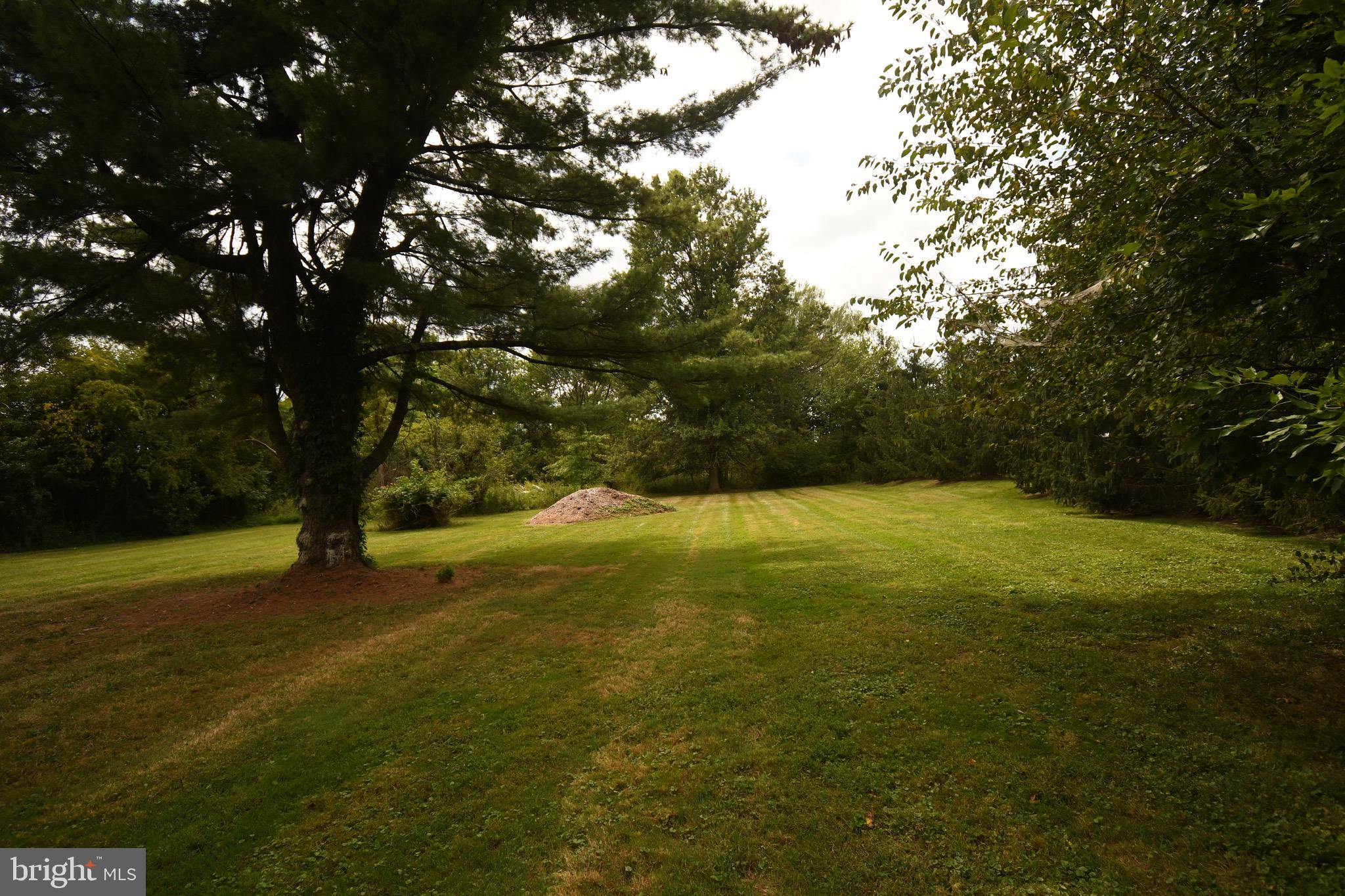 4776 Old Easton Road, Unit 2 Doylestown, PA 18902 - Photo 21 of 25 a view of outdoor space with deck and yard