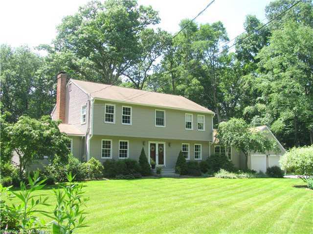 23 Greencrest Road Avon, CT 06001 - Photo 1 of 1 a front view of a house with a yard