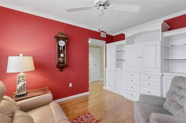 a bed room with a bed and a lamp