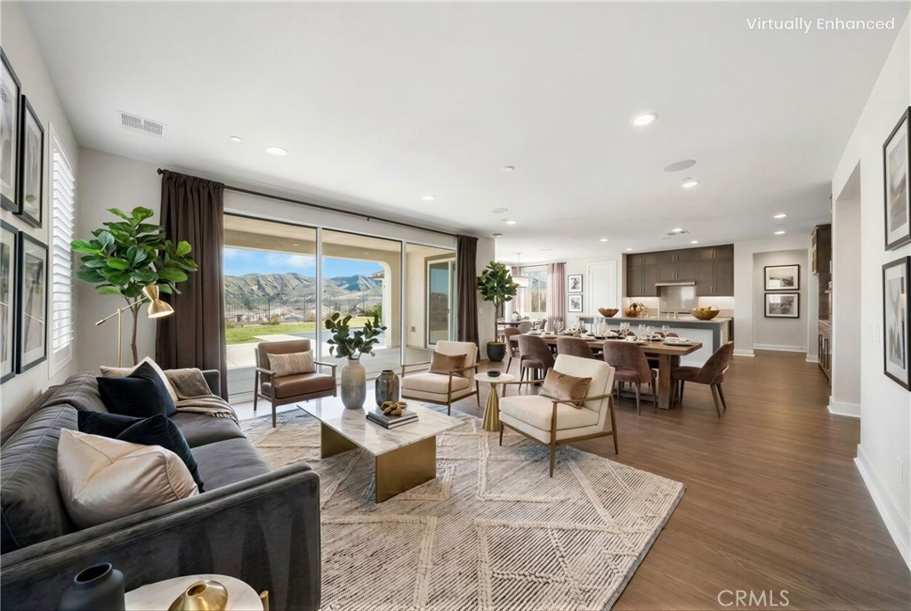 25110 Cherry Ridge Drive Canyon Country, CA 91387 - Photo 15 of 74 a living room with furniture and a large window
