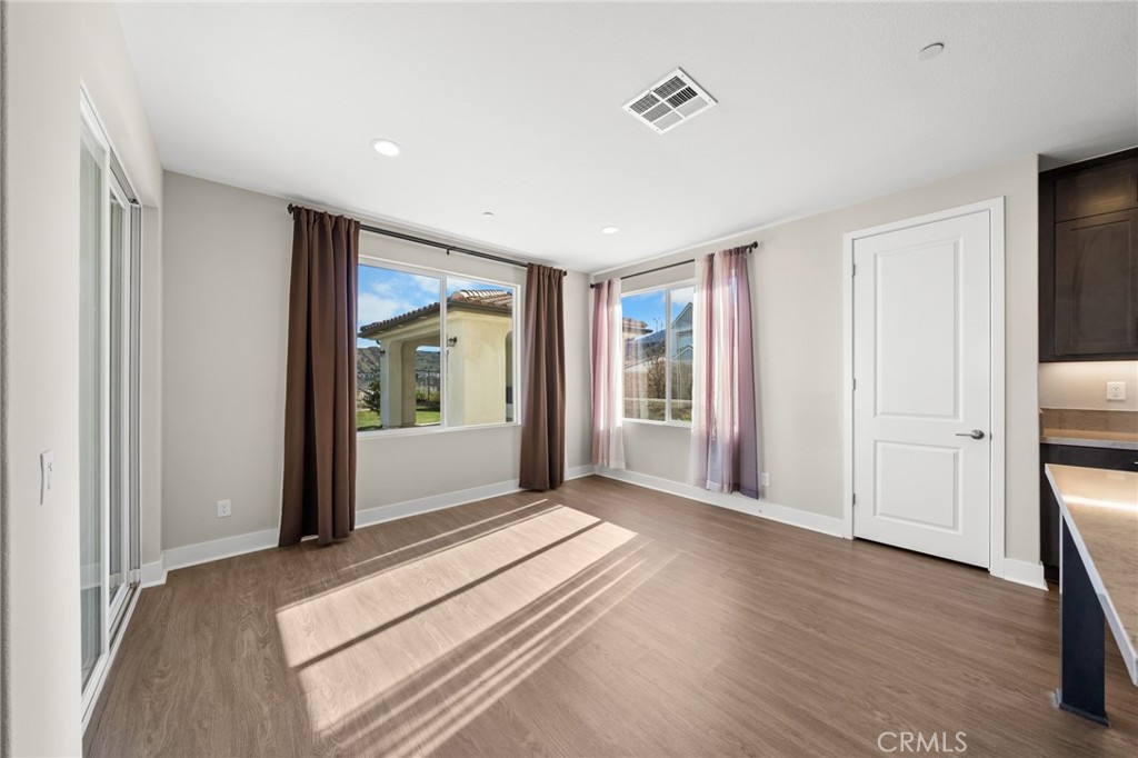 25110 Cherry Ridge Drive Canyon Country, CA 91387 - Photo 30 of 74 a view of a room with wooden floor and windows