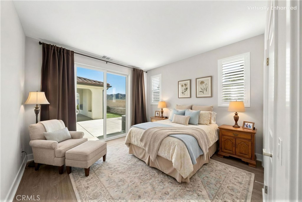 25110 Cherry Ridge Drive Canyon Country, CA 91387 - Photo 32 of 74 a bedroom with a bed and a couch