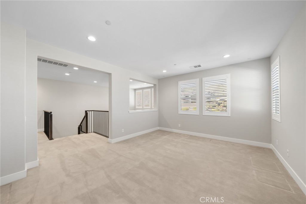 25110 Cherry Ridge Drive Canyon Country, CA 91387 - Photo 38 of 74 a view of an empty room with a window