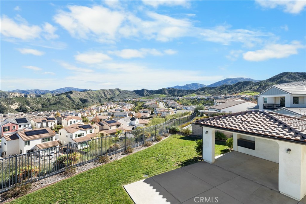 25110 Cherry Ridge Drive Canyon Country, CA 91387 - Photo 47 of 74 a view of a city from a terrace