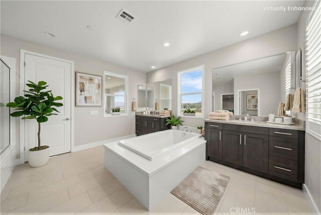25110 Cherry Ridge Drive Canyon Country, CA 91387 - Photo 49 of 74 a large white kitchen with a sink and dishwasher