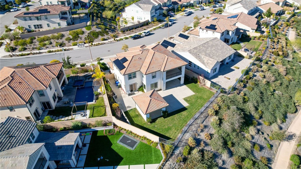 25110 Cherry Ridge Drive Canyon Country, CA 91387 - Photo 5 of 74 an aerial view of a house with swimming pool and outdoor seating