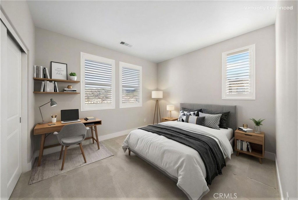 25110 Cherry Ridge Drive Canyon Country, CA 91387 - Photo 56 of 74 a bedroom with a bed and a window