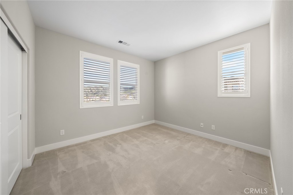 25110 Cherry Ridge Drive Canyon Country, CA 91387 - Photo 57 of 74 a view of an empty room with a window