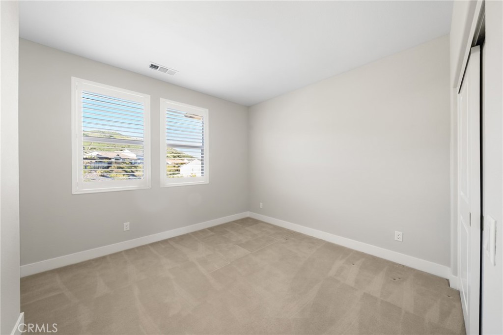 25110 Cherry Ridge Drive Canyon Country, CA 91387 - Photo 63 of 74 an empty room with a window