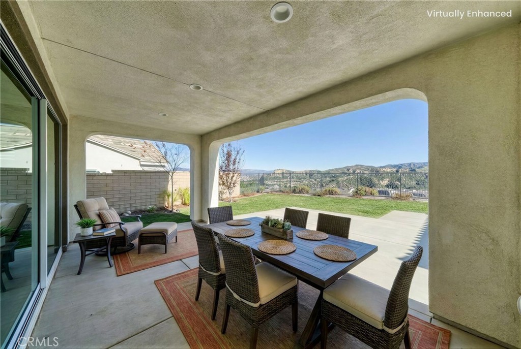 25110 Cherry Ridge Drive Canyon Country, CA 91387 - Photo 64 of 74 a view of a dining room with furniture window and outside view