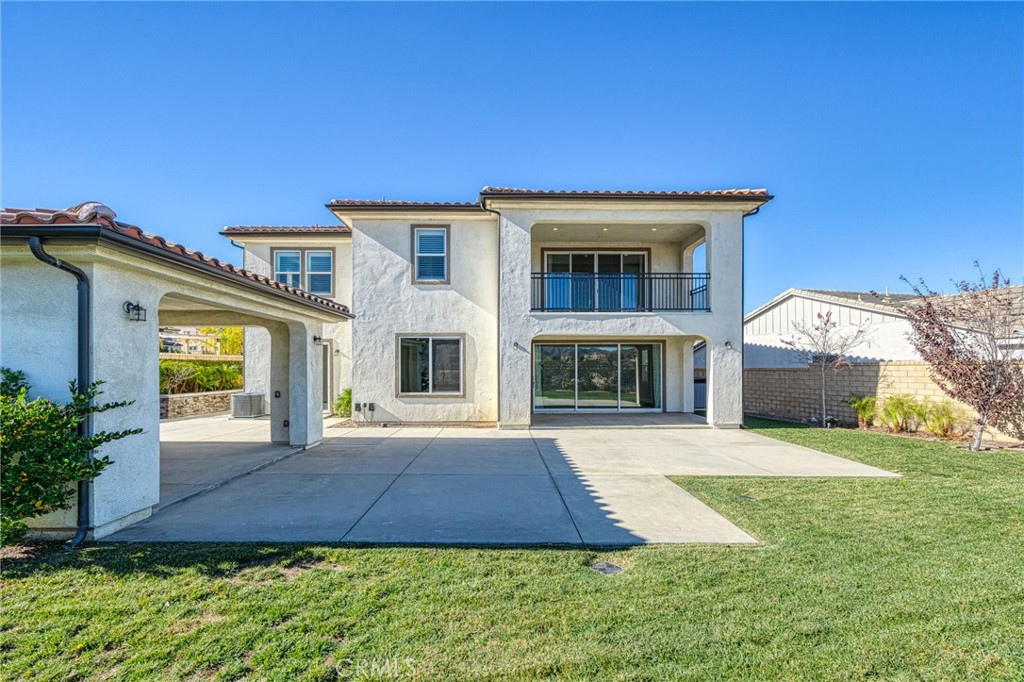 25110 Cherry Ridge Drive Canyon Country, CA 91387 - Photo 67 of 74 front view of a house with a yard