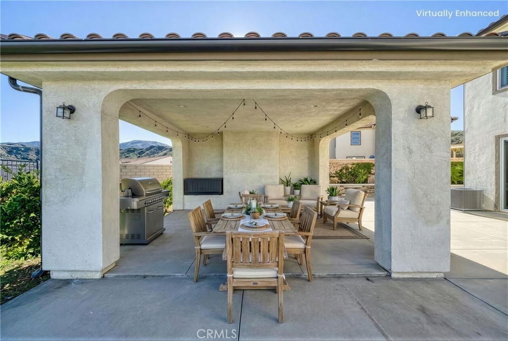 25110 Cherry Ridge Drive Canyon Country, CA 91387 - Photo 72 of 74 a living room with furniture and a floor to ceiling window