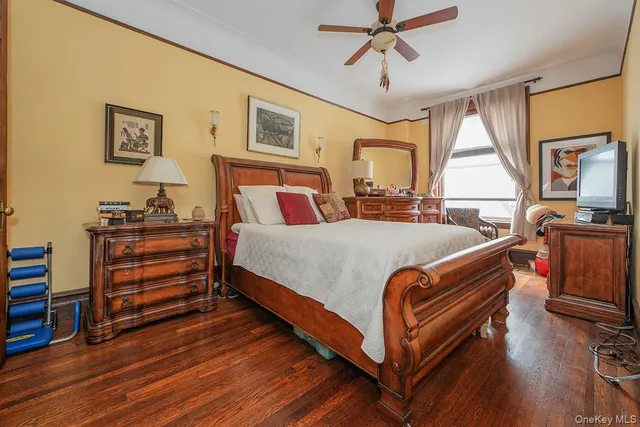 a bed room with a bed and a window