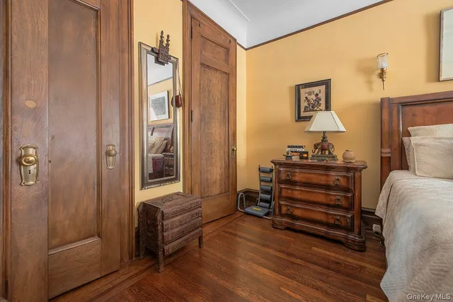a view of room with furniture and wooden floor