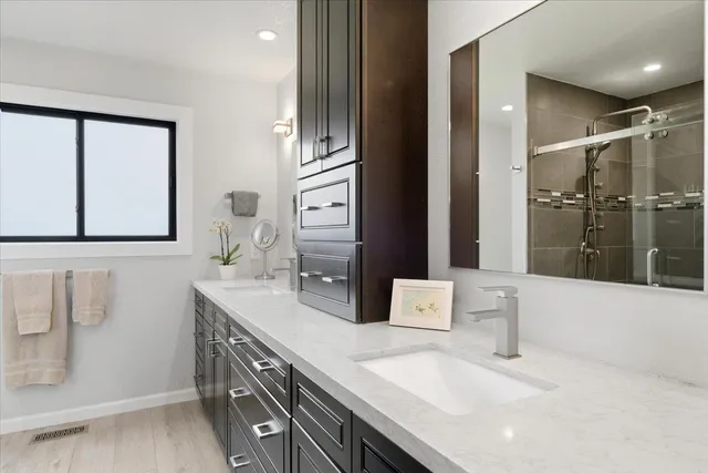 a bathroom with a sink and a mirror