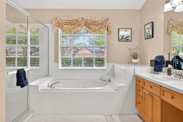 a living room with a flat screen tv and a window