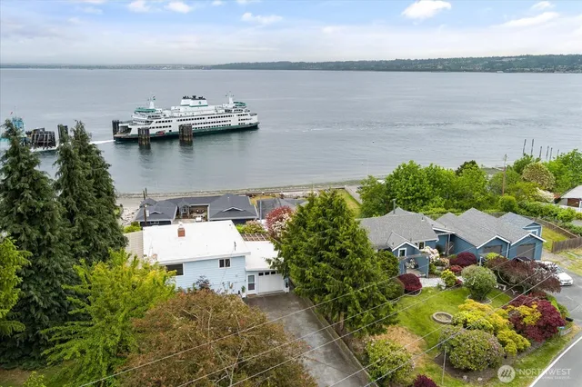 a view of a lake with sitting area