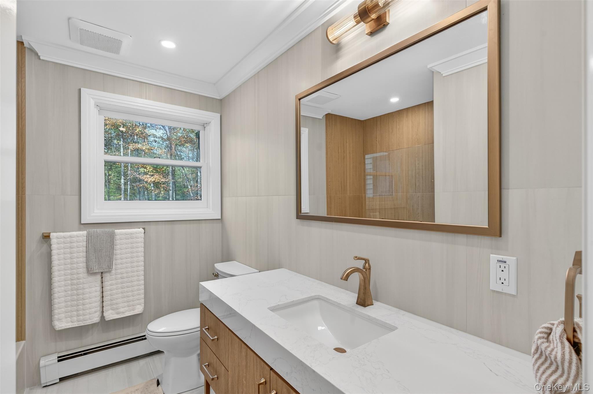 55 Ginger Road High Falls, NY 12440 - Photo 15 of 47 a bathroom with a sink a toilet and mirror