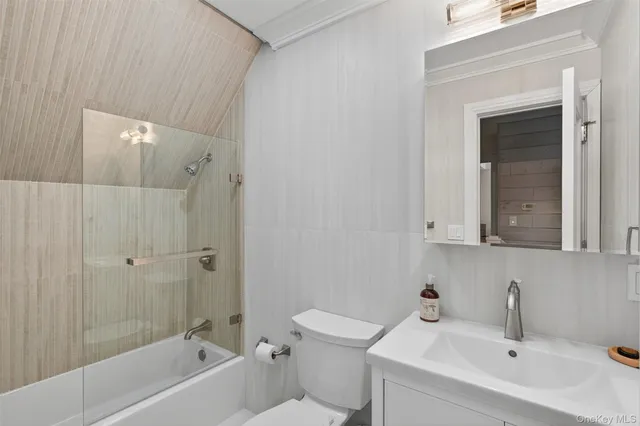 a bed room with a bed and a dresser