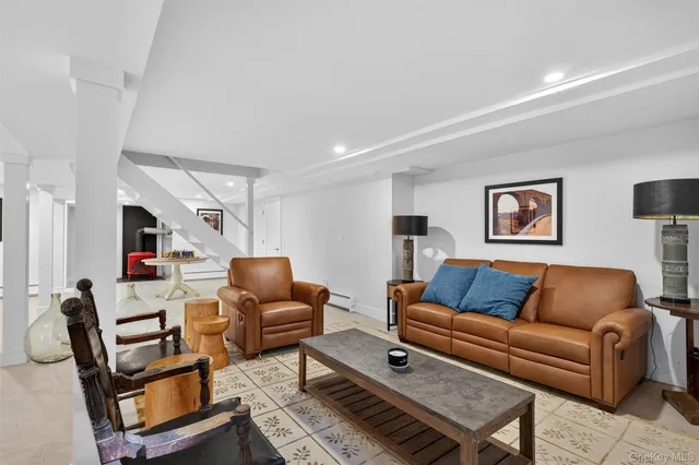a view of a house with backyard porch and sitting area
