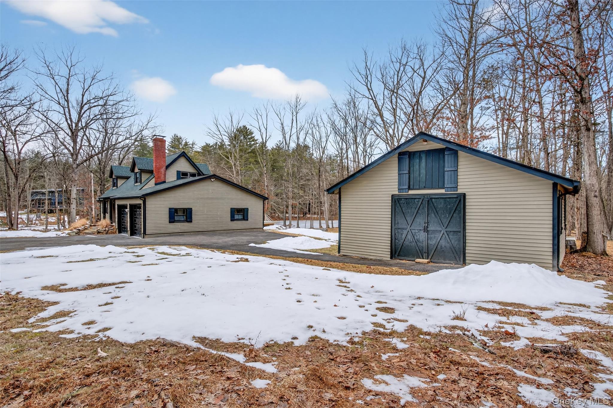 55 Ginger Road High Falls, NY 12440 - Photo 30 of 47 a view of a house with a yard covered in snow