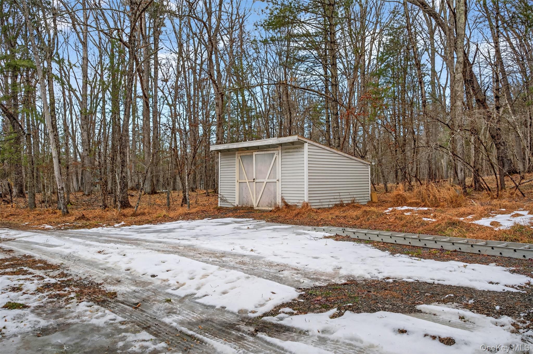 55 Ginger Road High Falls, NY 12440 - Photo 34 of 47 a backyard of a house with trees and outdoor seating