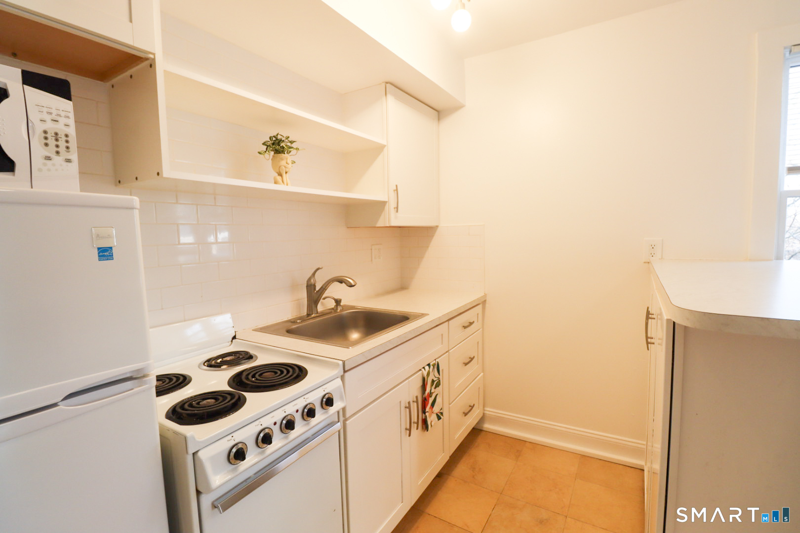 51 Franklin Street New London, CT 06320 - Photo 4 of 12 a utility room with dryer and washer