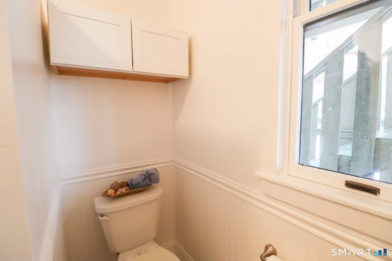 51 Franklin Street New London, CT 06320 - Photo 10 of 12 a bathroom with a toilet and a sink