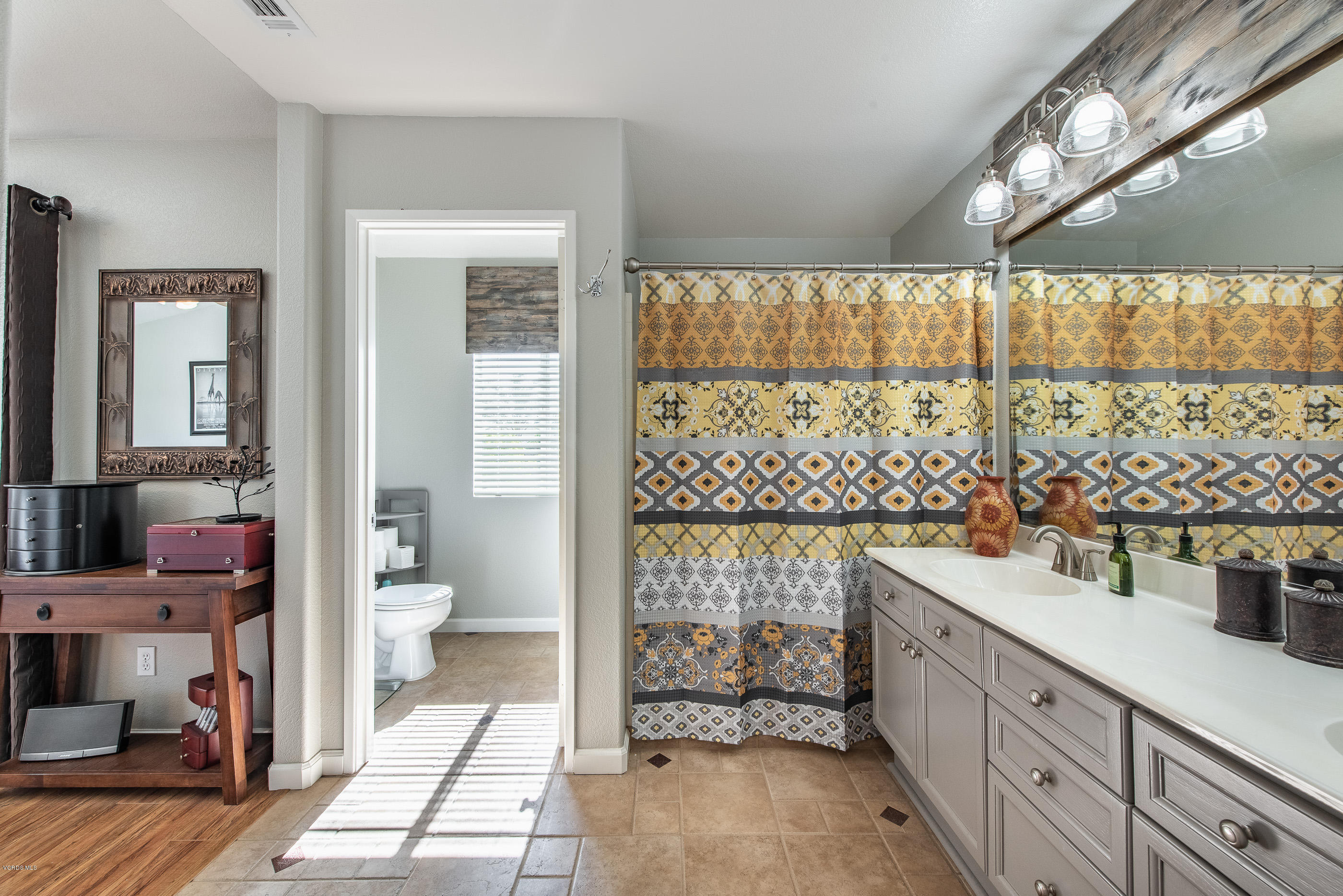 2050 Avila Place Oxnard, CA 93036 - Photo 21 of 31 a bathroom with a sink toilet and shower