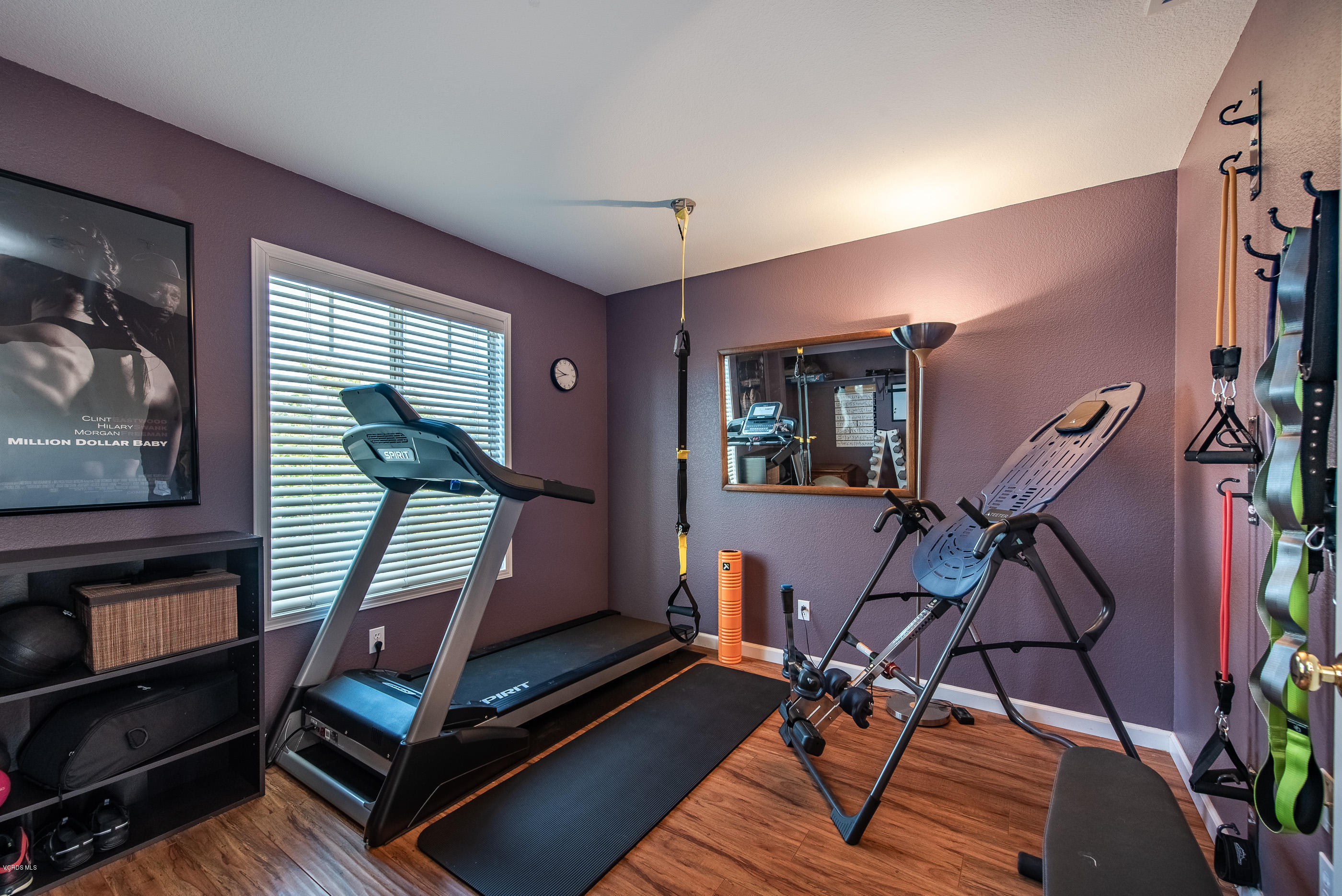 2050 Avila Place Oxnard, CA 93036 - Photo 23 of 31 a room with gym equipment and wooden floor