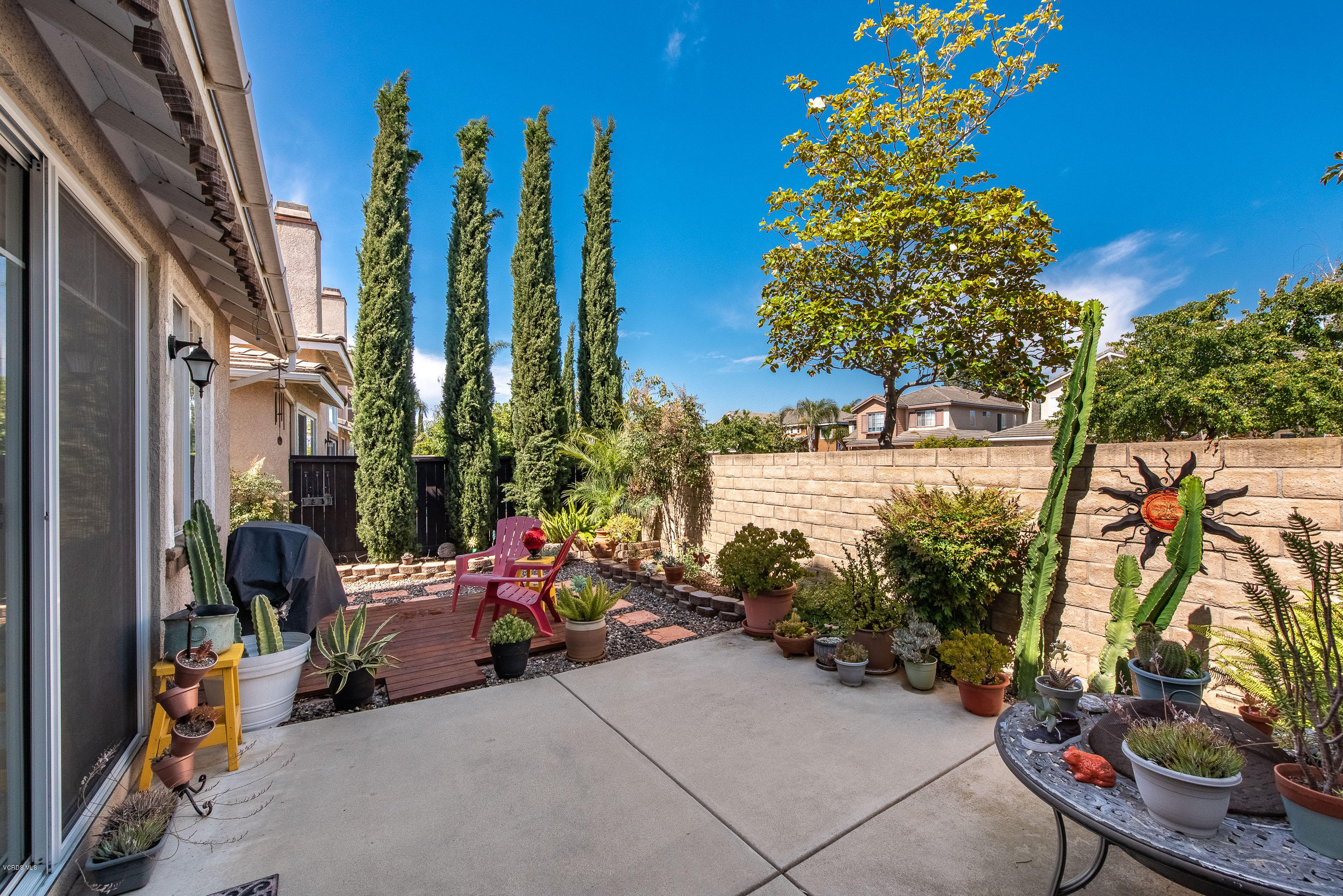 2050 Avila Place Oxnard, CA 93036 - Photo 27 of 31 a view of a patio with iron fence