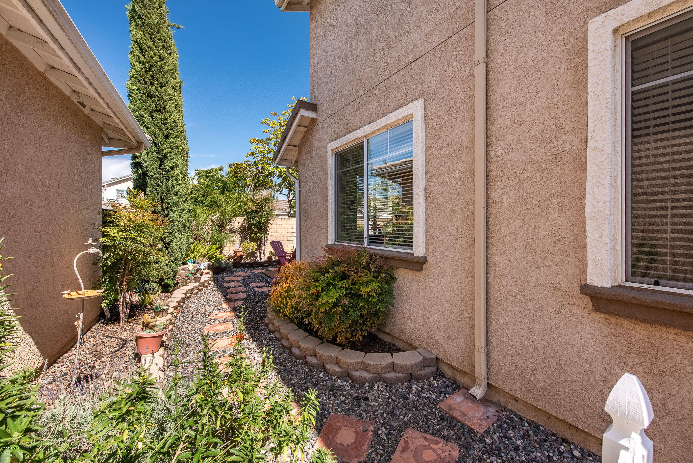 2050 Avila Place Oxnard, CA 93036 - Photo 30 of 31 a view of a backyard with potted plants