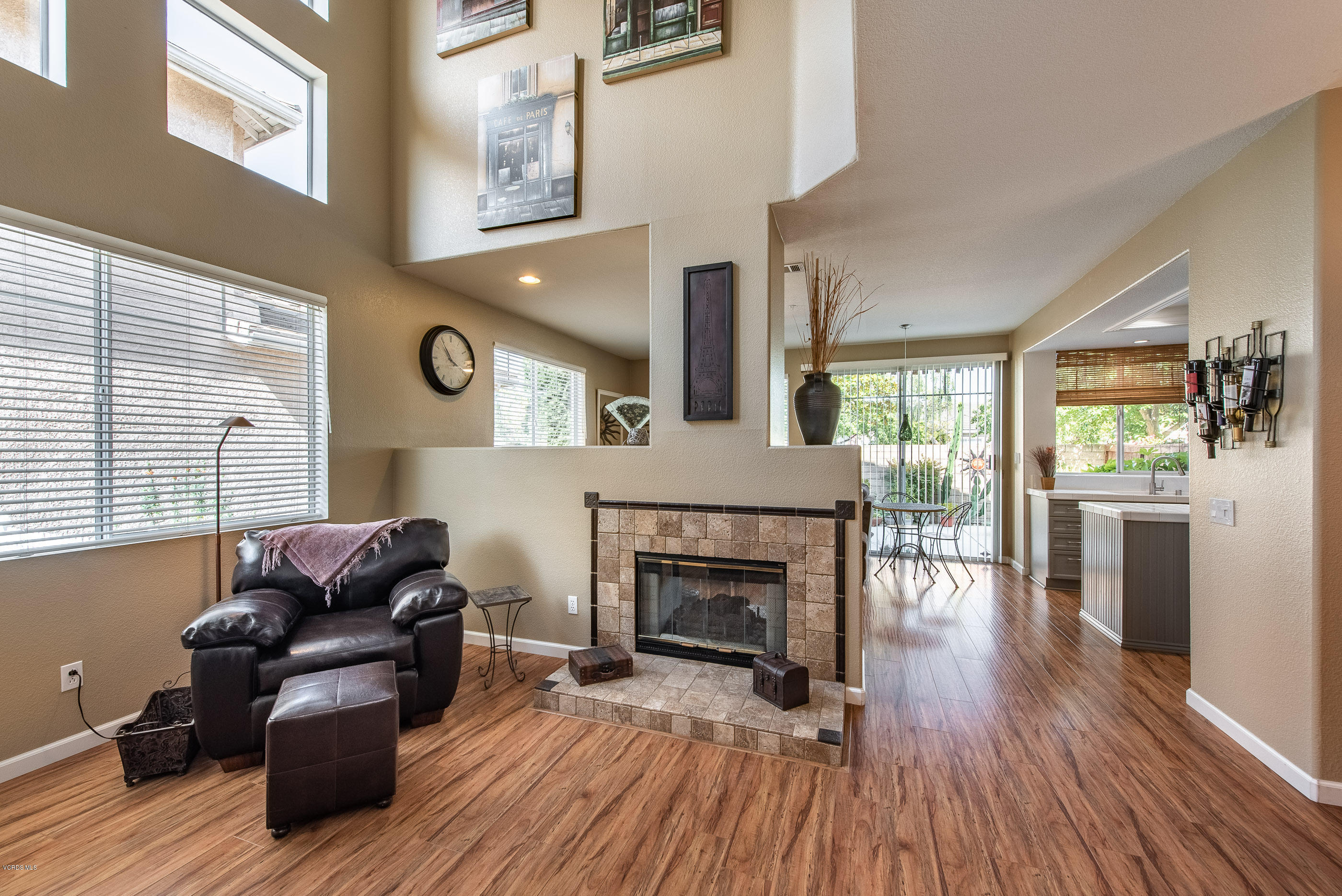 2050 Avila Place Oxnard, CA 93036 - Photo 9 of 31 a living room with furniture and a fireplace