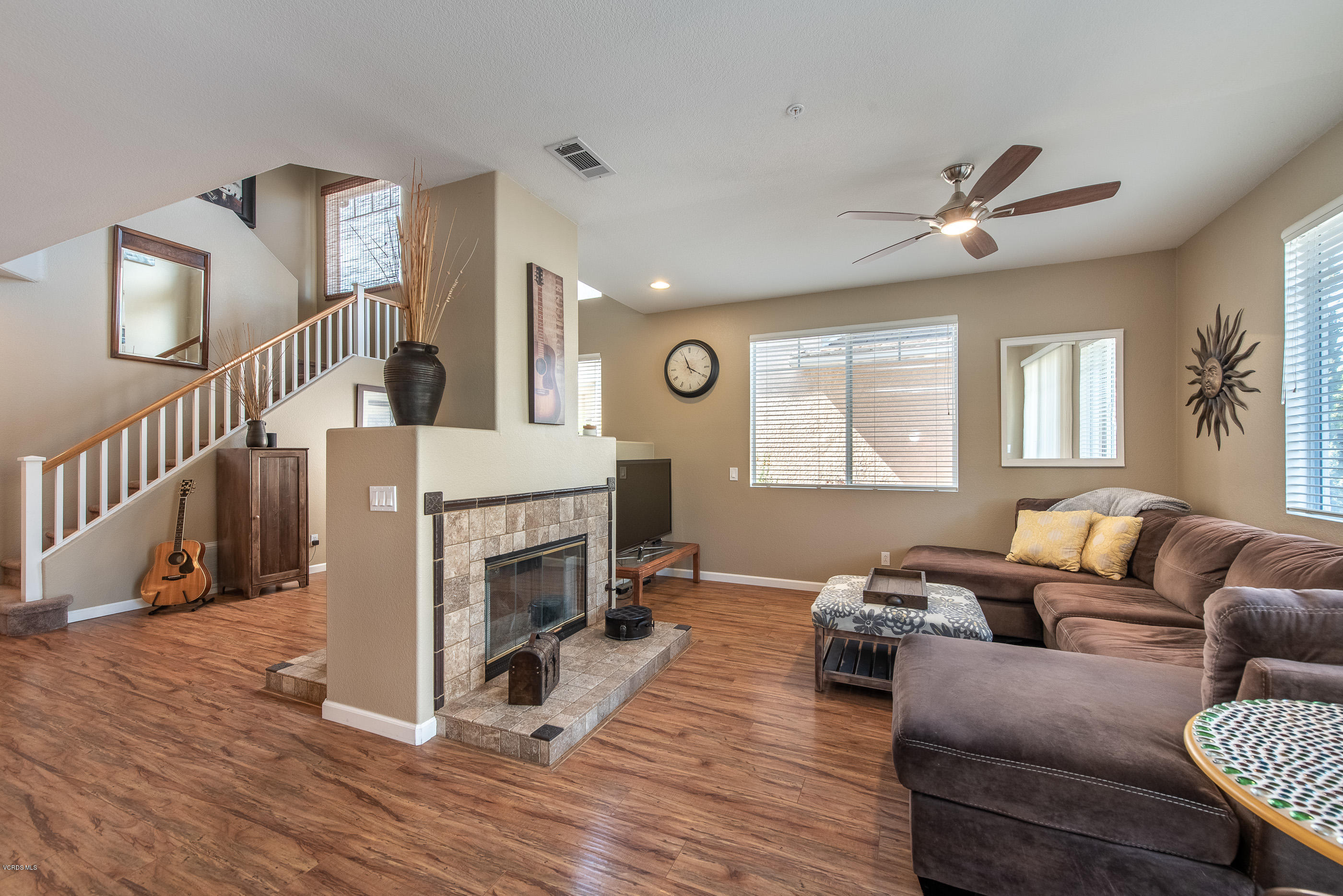 2050 Avila Place Oxnard, CA 93036 - Photo 10 of 31 a living room with furniture and a fireplace