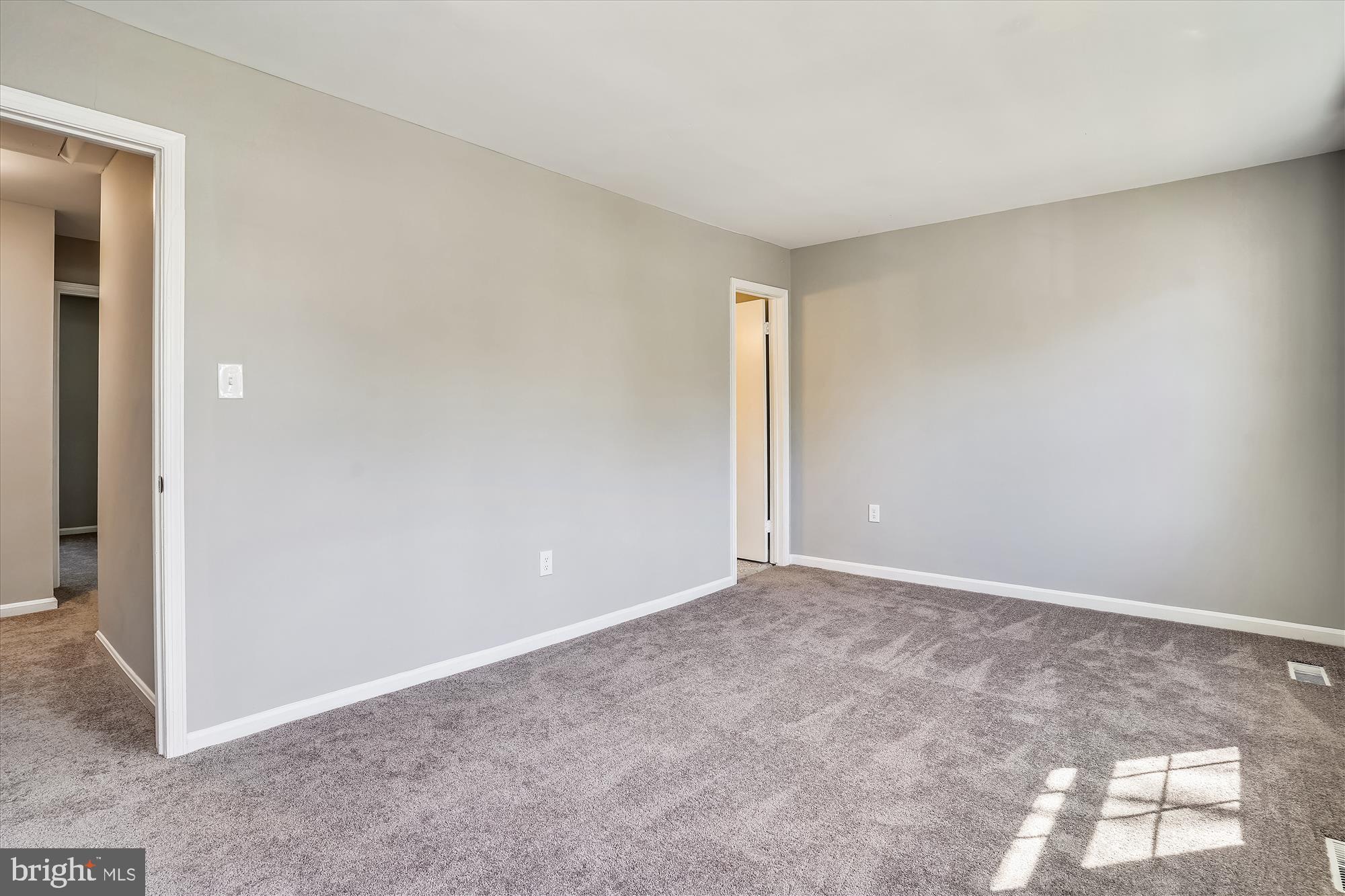 9202 Sprucewood Road Burke, VA 22015 - Photo 16 of 21 an empty room with closet
