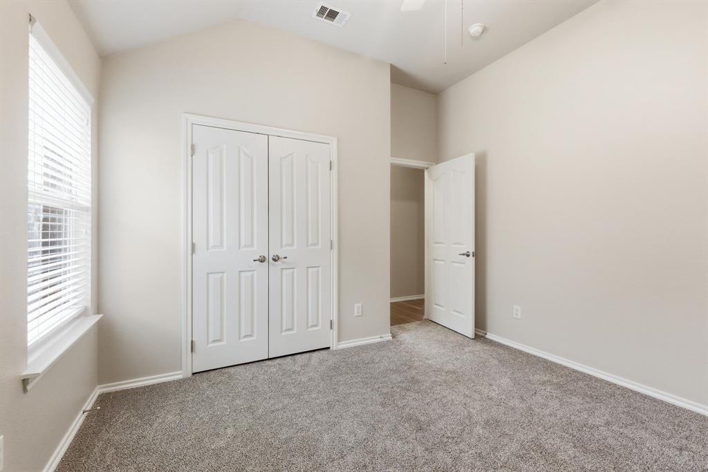 817 Huebner Way Burleson, TX 76028 - Photo 23 of 35 Another view of the bedroom which shows the nice window for natural light.