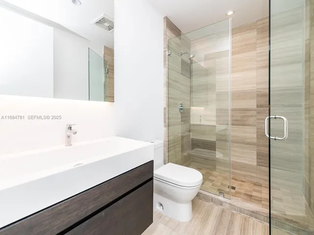 a front view of residential houses with yard