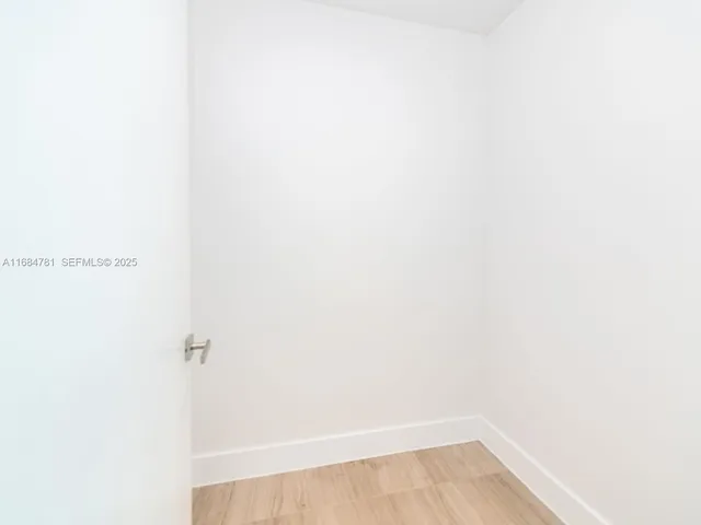 a view of swimming pool with outdoor seating and plants