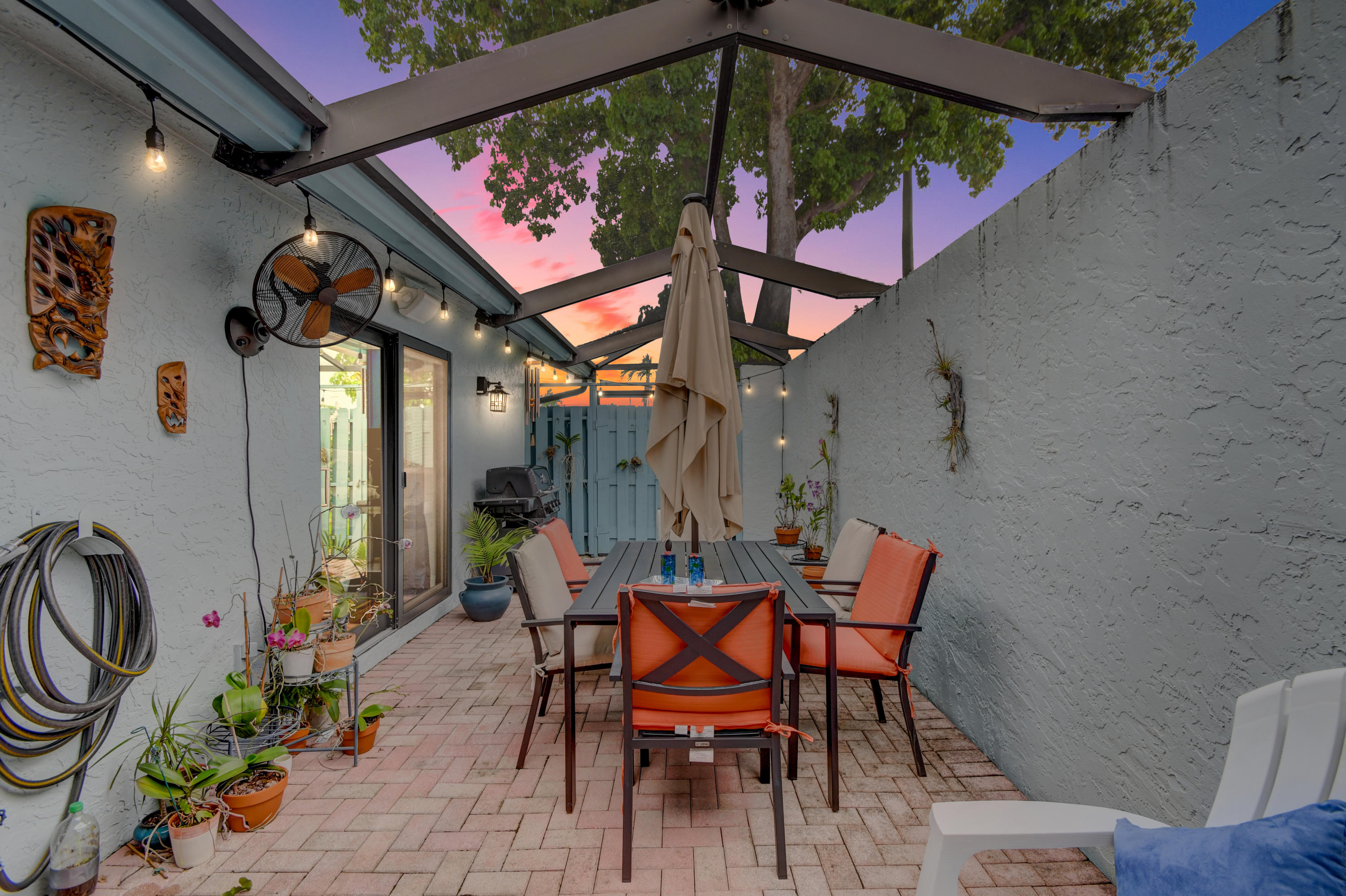 9103 Southwest 20th Street, Unit A Boca Raton, FL 33428 - Photo 5 of 52 Patio Twilight
