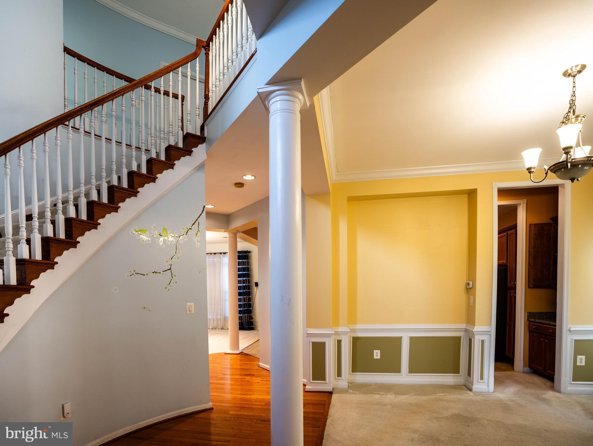 9571 Linnett Hill Drive Lorton, VA 22079 - Photo 4 of 27 a view of entryway with wooden floor and door