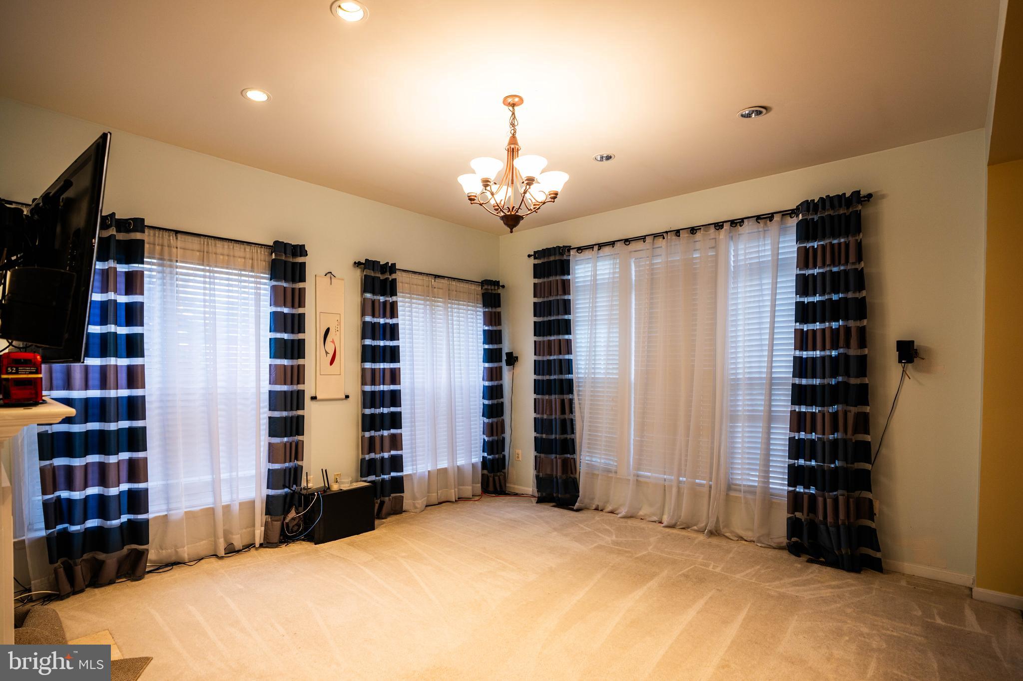 9571 Linnett Hill Drive Lorton, VA 22079 - Photo 6 of 27 a bedroom with furniture and window