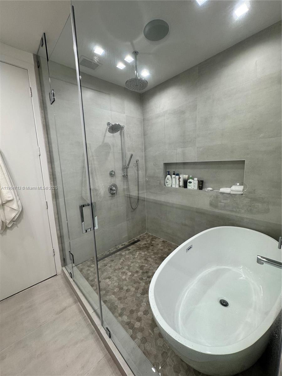 6824 Southwest 80th Street Miami, FL 33143 - Photo 14 of 29 a bathroom with a sink and a mirror